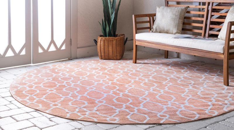 Patio Paradise Collection Area Rug - Lagoon Round Peach lifestyle 63