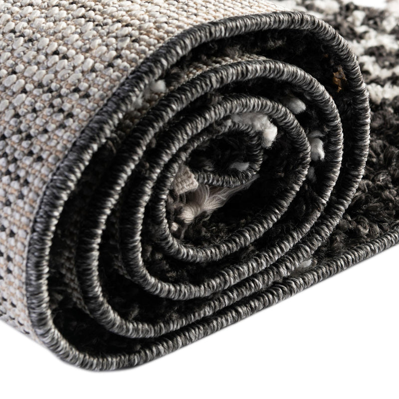 Tranquil Tides Shag Collection Area Rug - Pebble Round Black and White lifestyle 105