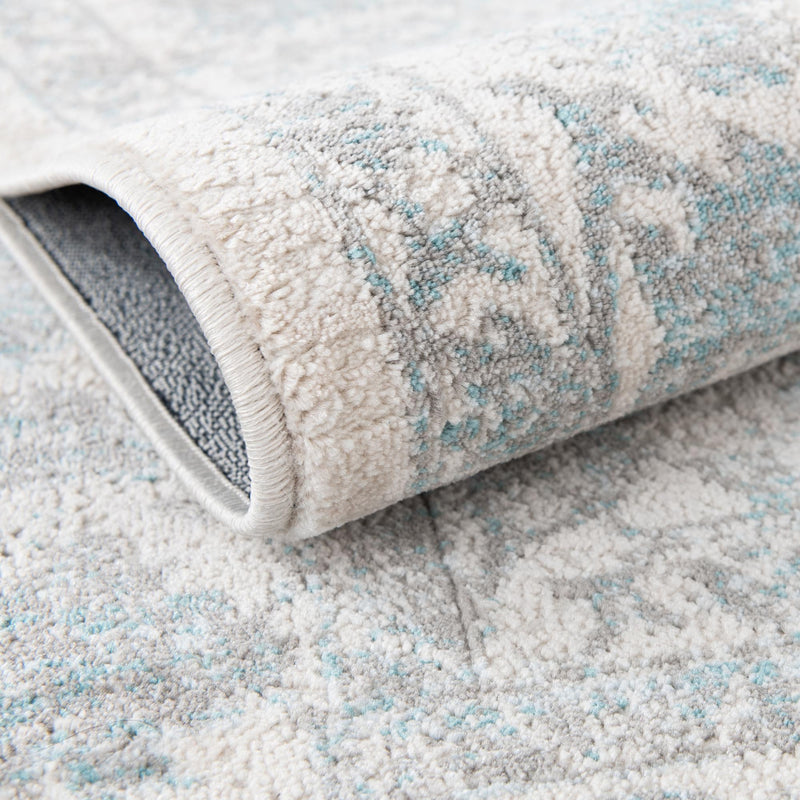 Metro Heights Collection Area Rug - Astoria Round Teal lifestyle 45