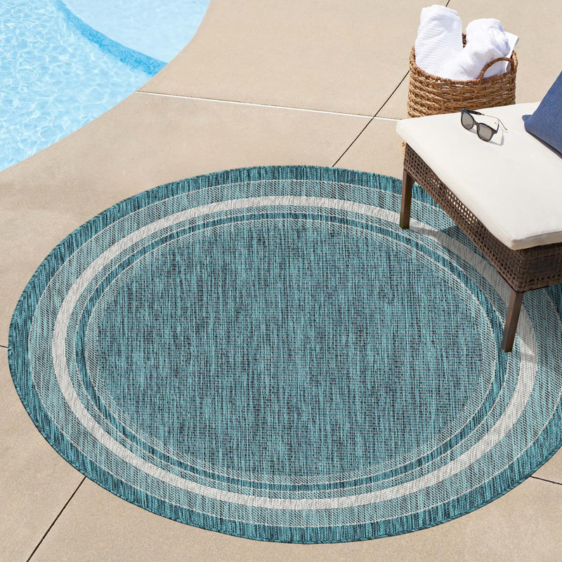 Patio Perimeter Collection Area Rug - Veranda (Teal) Round Teal  lifestyle 102