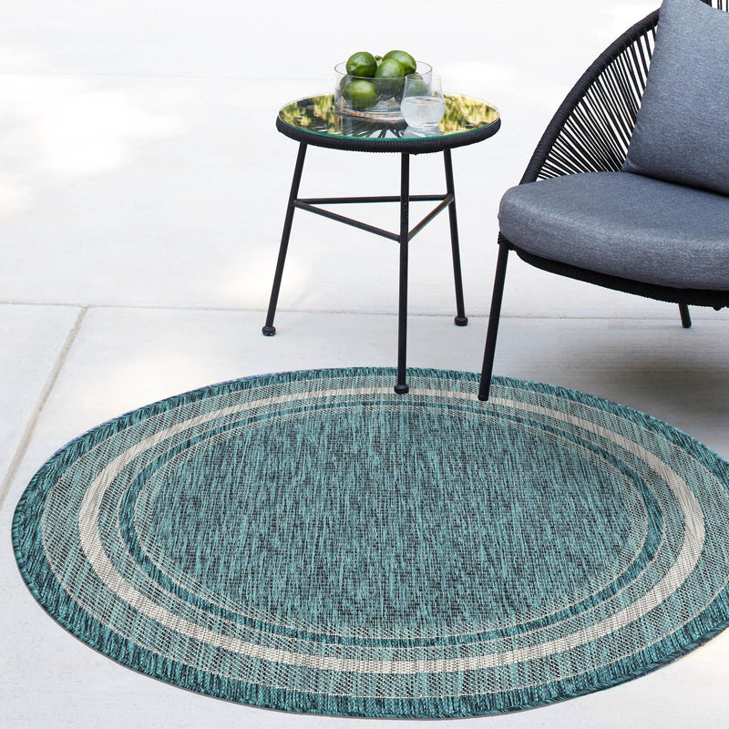 Patio Perimeter Collection Area Rug - Veranda (Teal) Round Teal  lifestyle 109