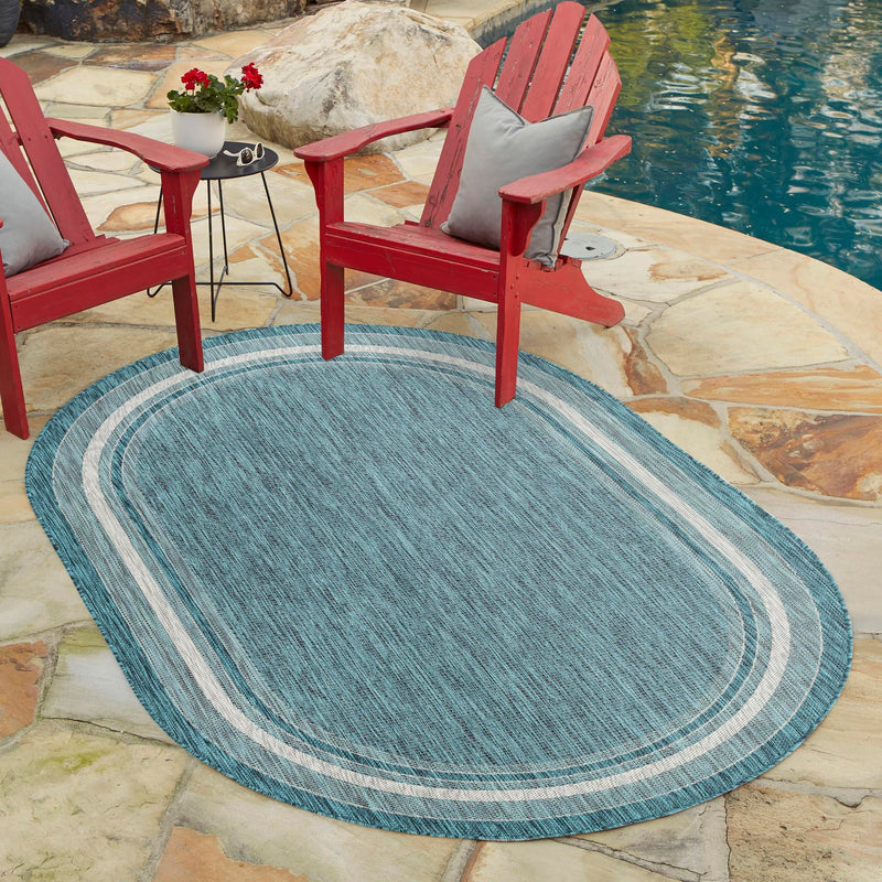 Patio Perimeter Collection Area Rug - Veranda (Teal) Oval Teal  lifestyle 6