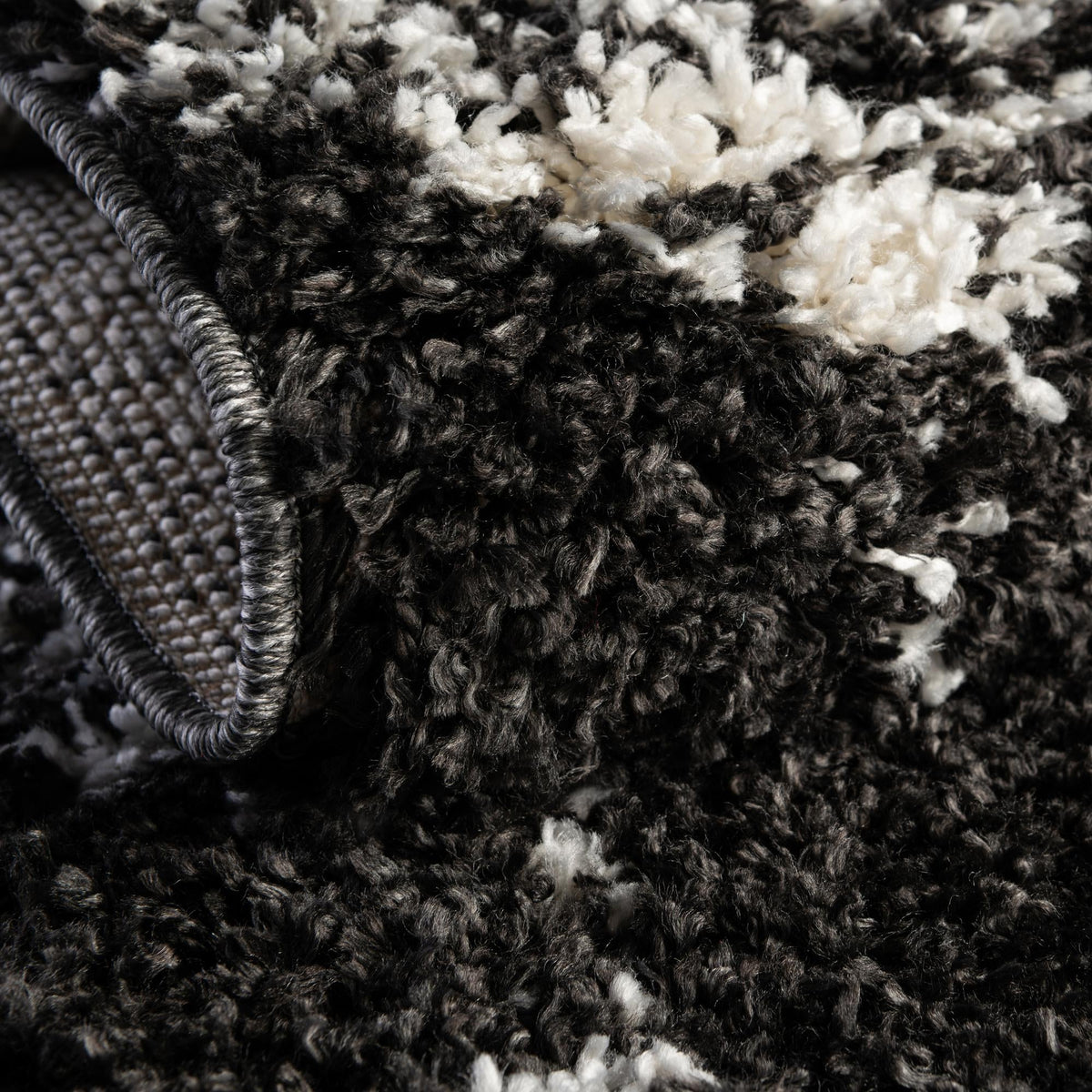 Tranquil Tides Shag Collection Area Rug -  Pebble Rectangle Black and White  lifestyle 20