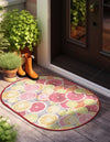 Belizean Tropics Outdoor Rugs Collection Area Rug -  Savanna Oval Rust Red and Yellow  lifestyle 28