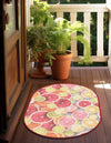 Belizean Tropics Outdoor Rugs Collection Area Rug -  Savanna Oval Rust Red and Yellow  lifestyle 30