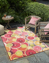 Belizean Tropics Outdoor Rugs Collection Area Rug -  Savanna Rectangle Rust Red and Yellow  lifestyle 2