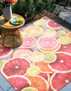 Belizean Tropics Outdoor Rugs Collection Area Rug -  Savanna Square Rust Red and Yellow  lifestyle 29