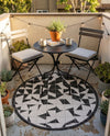 Urban Terrace Collection Area Rug -  Mercer Round Black and White  lifestyle 57