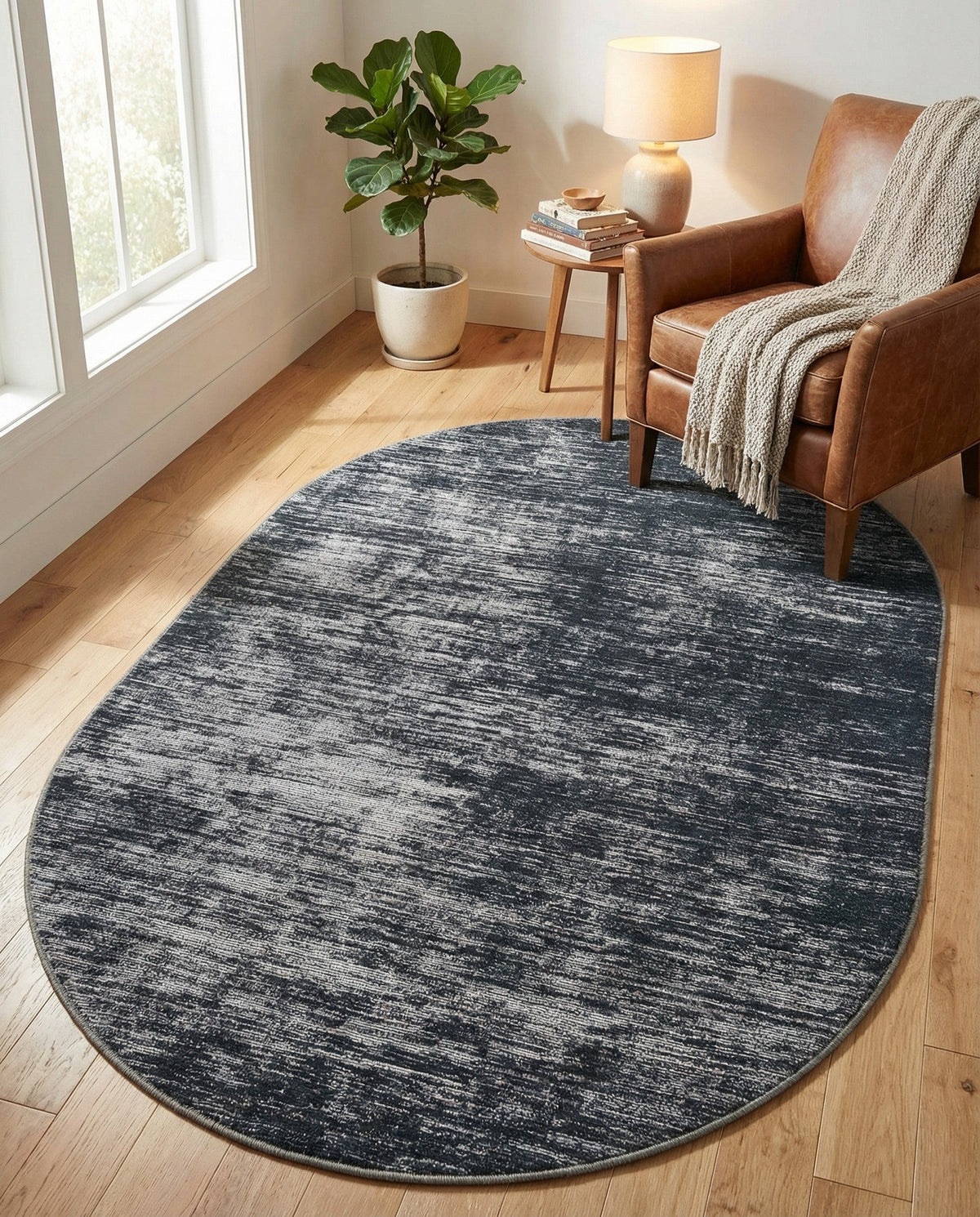 Sahara Essence Collection Area Rug - Oasis (Black) Oval Black  lifestyle 81