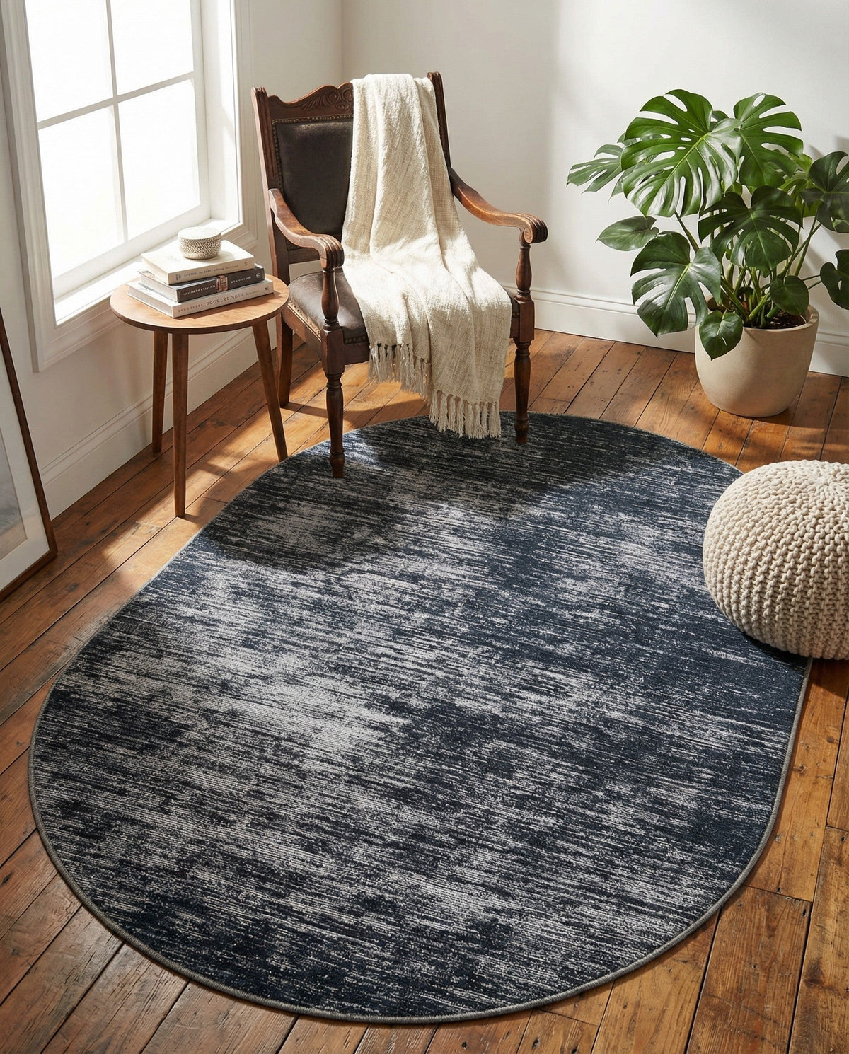 Sahara Essence Collection Area Rug - Oasis (Black) Oval Black  lifestyle 82