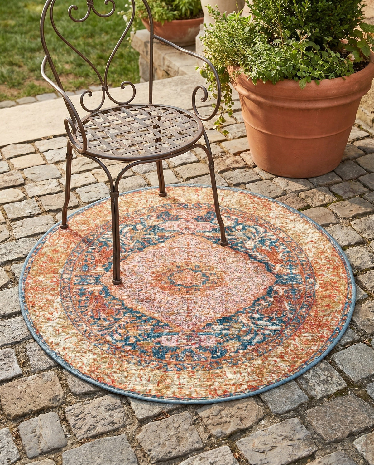 Patio Heritage Collection Area Rug -  Courtyard Round Navy Blue and Light Pink  lifestyle 74